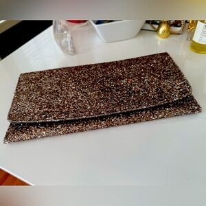 Rose gold Banana Republic envelope clutch